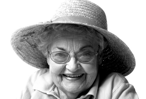 Elderly woman in broad brim hat