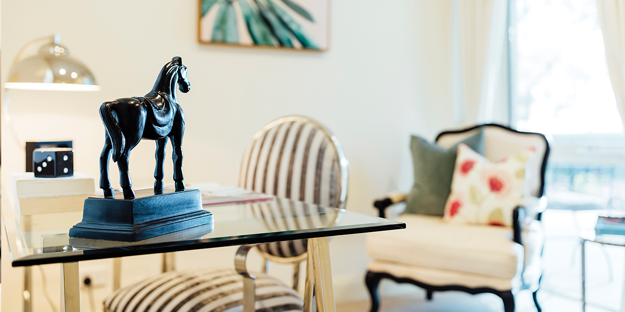 miniature horse statue on desk