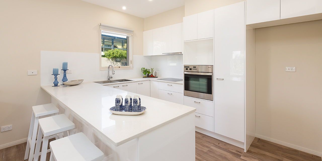 Kitchen and bench seating at Karana Retirement Community, Baptcare. Boutique living in Kew