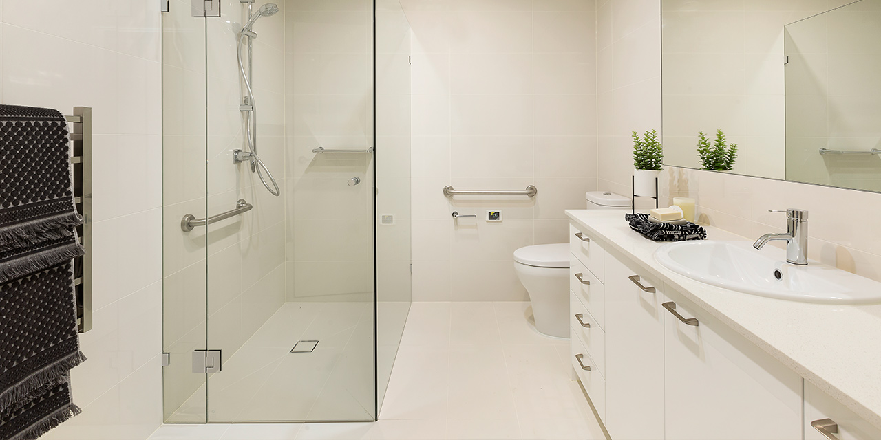 Bathroom and glass walled shower at Karana Retirement Community, Baptcare. Boutique aged care in Kew, Melbourne.