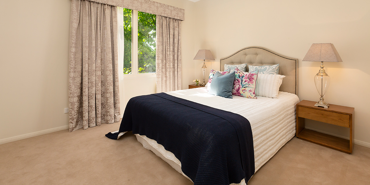Master bedroom and bed at Karana Retirement Community, Baptcare. Boutique aged care in Kew, Melbourne.